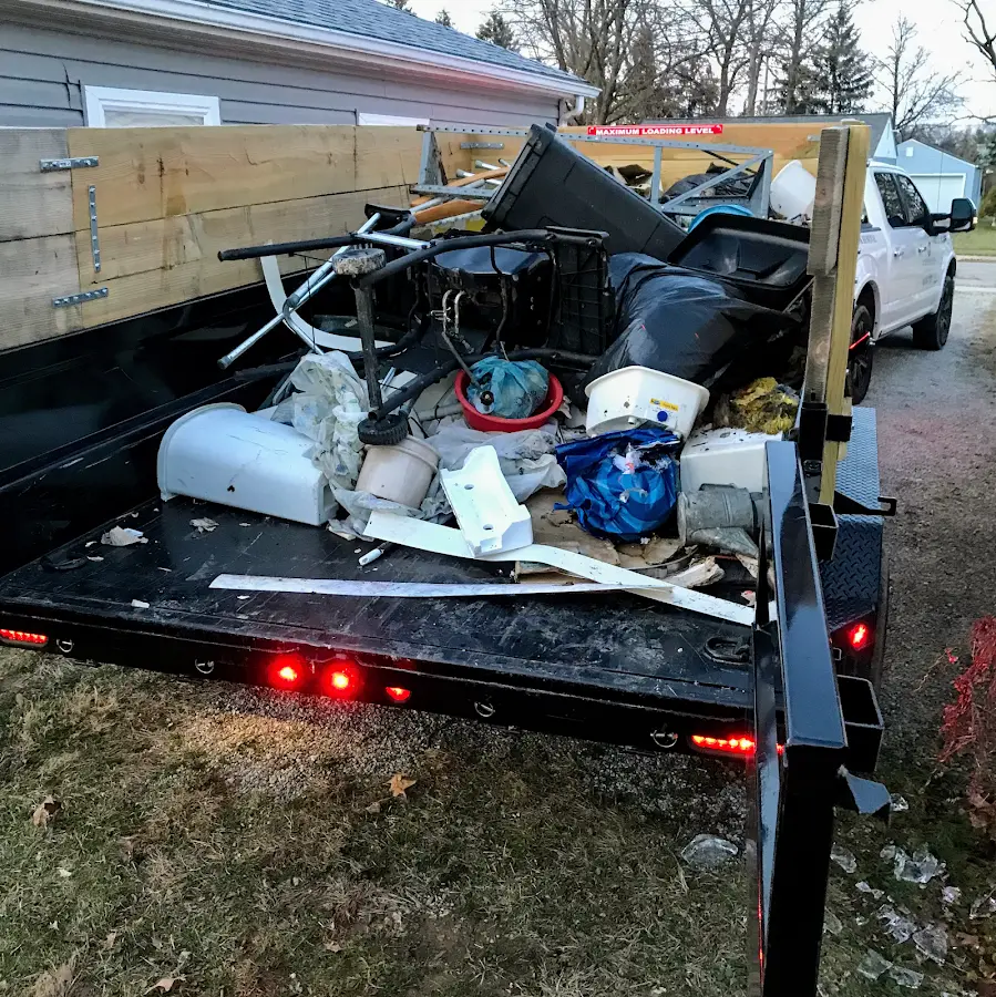 Roll-off dumpster delivered to a residential driveway in Florence